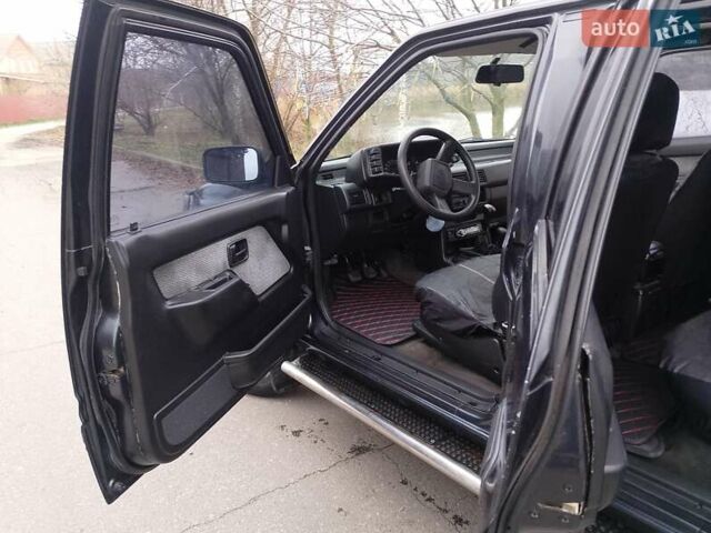 Черный Опель Фронтера, объемом двигателя 2.2 л и пробегом 329 тыс. км за 4999 $, фото 12 на Automoto.ua