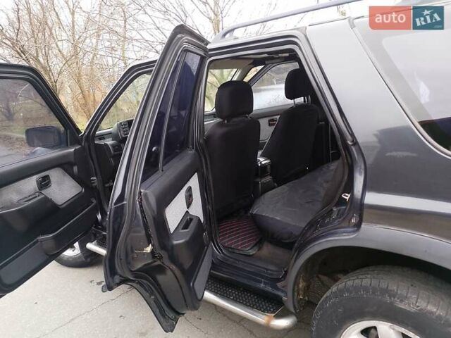 Черный Опель Фронтера, объемом двигателя 2.2 л и пробегом 329 тыс. км за 4999 $, фото 5 на Automoto.ua