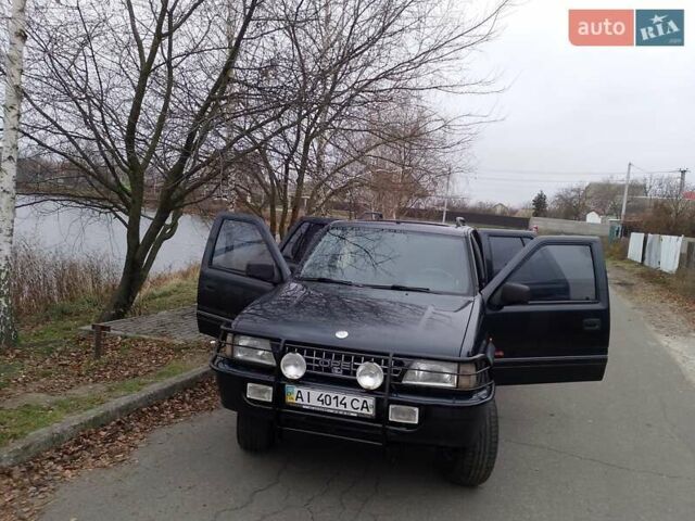 Черный Опель Фронтера, объемом двигателя 2.2 л и пробегом 329 тыс. км за 4999 $, фото 9 на Automoto.ua