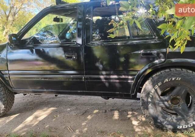Чорний Опель Фронтера, об'ємом двигуна 2.5 л та пробігом 274 тис. км за 3200 $, фото 6 на Automoto.ua