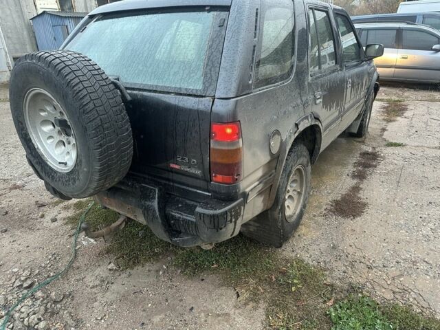 Чорний Опель Фронтера, об'ємом двигуна 0 л та пробігом 200 тис. км за 1650 $, фото 4 на Automoto.ua