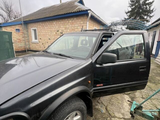 Чорний Опель Фронтера, об'ємом двигуна 2.5 л та пробігом 260 тис. км за 3500 $, фото 2 на Automoto.ua