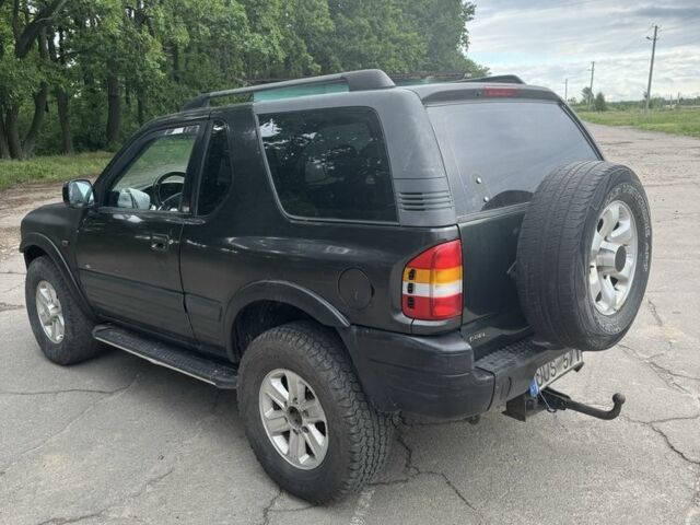 Черный Опель Фронтера, объемом двигателя 0 л и пробегом 250 тыс. км за 2700 $, фото 5 на Automoto.ua