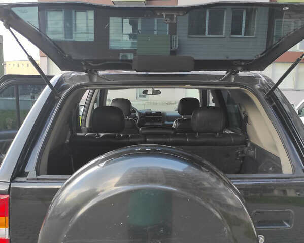 Черный Опель Фронтера, объемом двигателя 2.2 л и пробегом 36 тыс. км за 5500 $, фото 5 на Automoto.ua