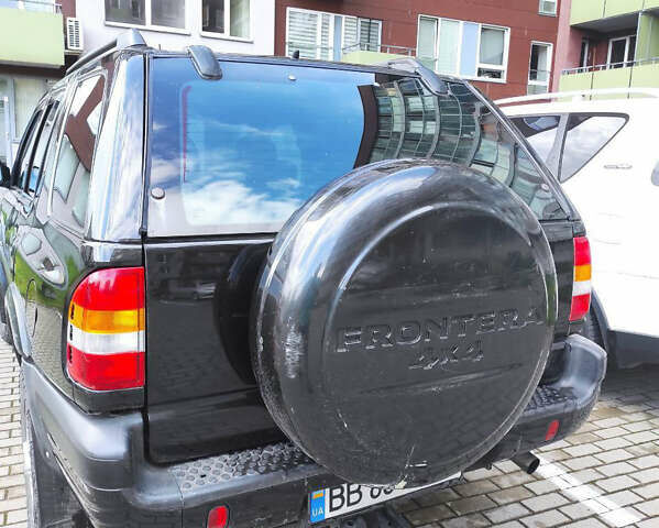 Черный Опель Фронтера, объемом двигателя 2.2 л и пробегом 36 тыс. км за 5500 $, фото 4 на Automoto.ua