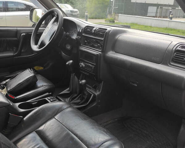 Черный Опель Фронтера, объемом двигателя 2.2 л и пробегом 36 тыс. км за 5500 $, фото 7 на Automoto.ua