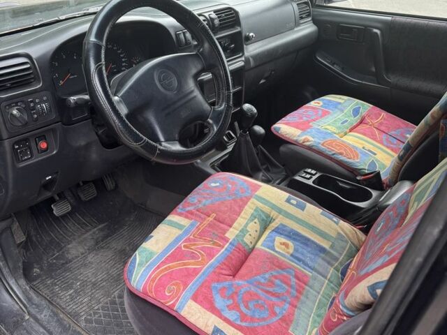 Черный Опель Фронтера, объемом двигателя 0 л и пробегом 250 тыс. км за 2700 $, фото 6 на Automoto.ua