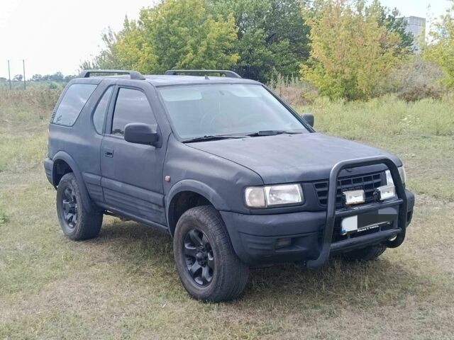 Чорний Опель Фронтера, об'ємом двигуна 2.3 л та пробігом 220 тис. км за 2950 $, фото 2 на Automoto.ua