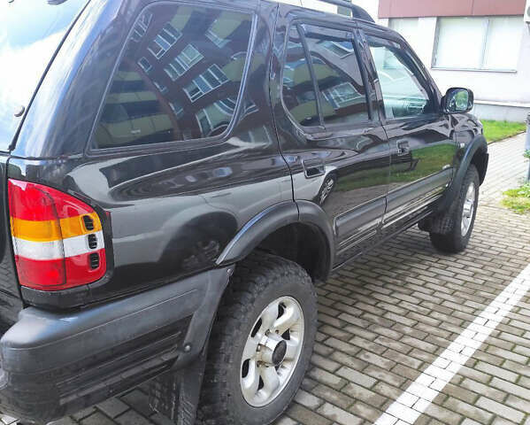 Черный Опель Фронтера, объемом двигателя 2.2 л и пробегом 36 тыс. км за 5500 $, фото 1 на Automoto.ua