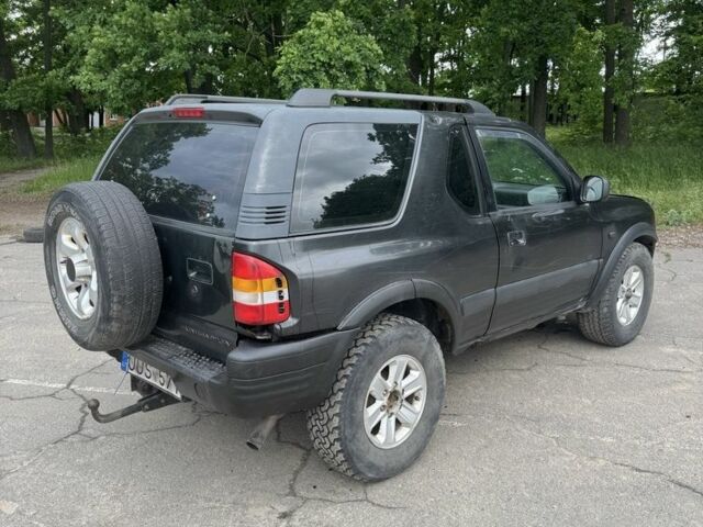 Черный Опель Фронтера, объемом двигателя 0 л и пробегом 250 тыс. км за 2700 $, фото 3 на Automoto.ua