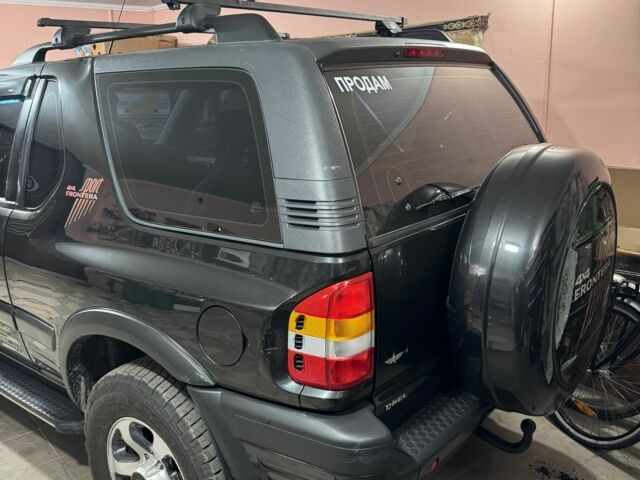 Чорний Опель Фронтера, об'ємом двигуна 2.2 л та пробігом 320 тис. км за 8000 $, фото 4 на Automoto.ua