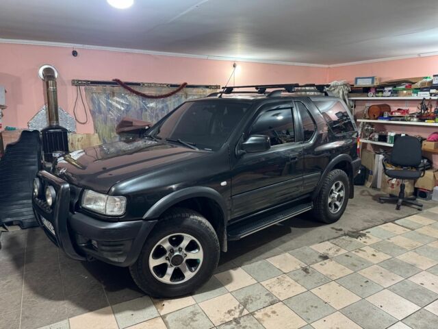 Чорний Опель Фронтера, об'ємом двигуна 2.2 л та пробігом 320 тис. км за 8000 $, фото 2 на Automoto.ua