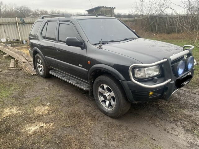 Черный Опель Фронтера, объемом двигателя 2.2 л и пробегом 300 тыс. км за 4100 $, фото 2 на Automoto.ua