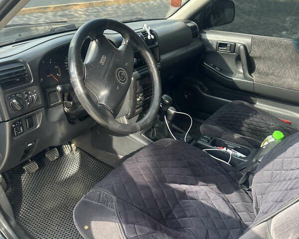 Чорний Опель Фронтера, об'ємом двигуна 2.2 л та пробігом 270 тис. км за 6500 $, фото 3 на Automoto.ua