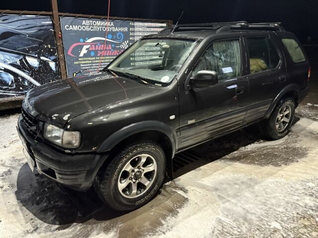Черный Опель Фронтера, объемом двигателя 2.2 л и пробегом 358 тыс. км за 2500 $, фото 1 на Automoto.ua