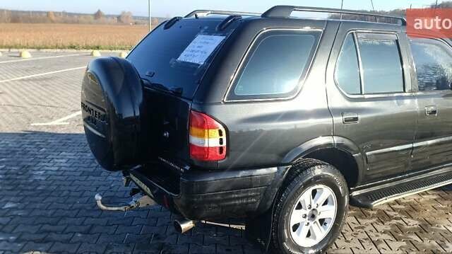 Черный Опель Фронтера, объемом двигателя 2.17 л и пробегом 335 тыс. км за 4800 $, фото 6 на Automoto.ua