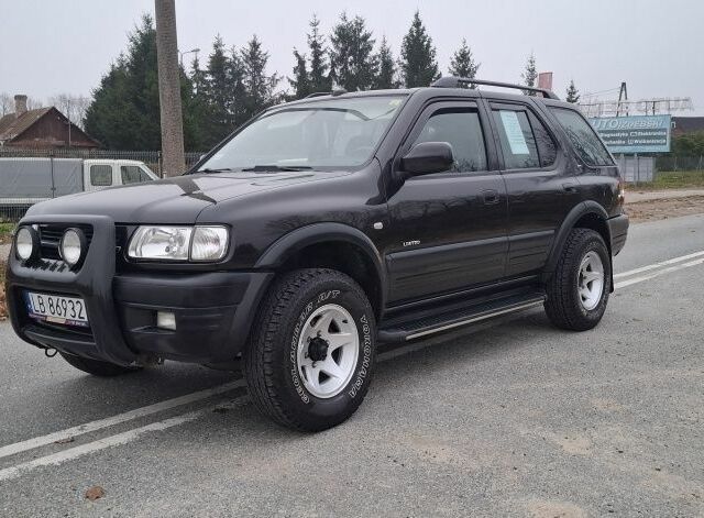 Чорний Опель Фронтера, об'ємом двигуна 2.2 л та пробігом 290 тис. км за 2100 $, фото 1 на Automoto.ua