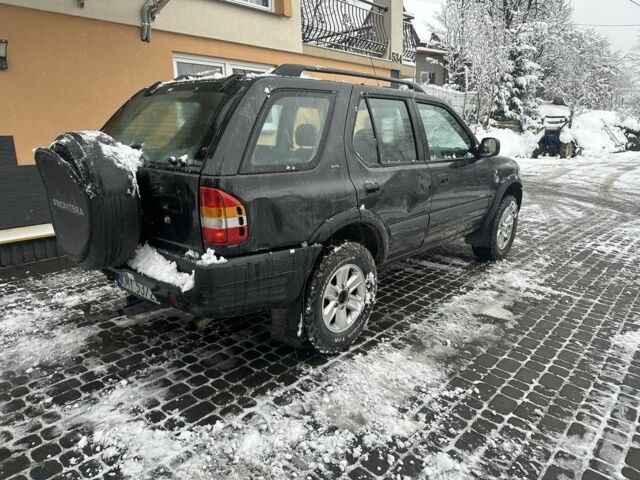 Черный Опель Фронтера, объемом двигателя 2.2 л и пробегом 280 тыс. км за 2750 $, фото 1 на Automoto.ua
