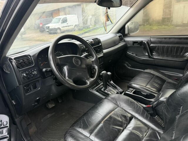 Черный Опель Фронтера, объемом двигателя 2.2 л и пробегом 276 тыс. км за 3500 $, фото 6 на Automoto.ua