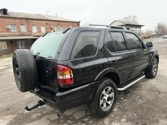 Черный Опель Фронтера, объемом двигателя 2.2 л и пробегом 276 тыс. км за 3500 $, фото 1 на Automoto.ua