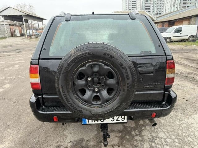Черный Опель Фронтера, объемом двигателя 2.2 л и пробегом 276 тыс. км за 3500 $, фото 5 на Automoto.ua