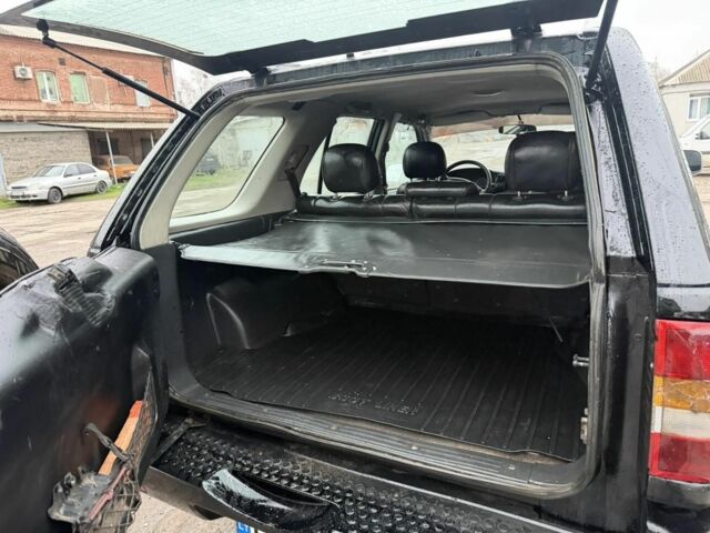 Черный Опель Фронтера, объемом двигателя 2.2 л и пробегом 276 тыс. км за 3500 $, фото 8 на Automoto.ua