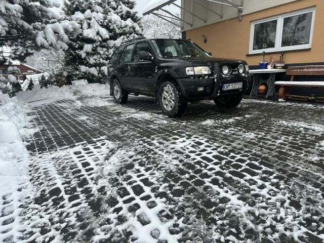 Черный Опель Фронтера, объемом двигателя 2.2 л и пробегом 280 тыс. км за 2750 $, фото 6 на Automoto.ua