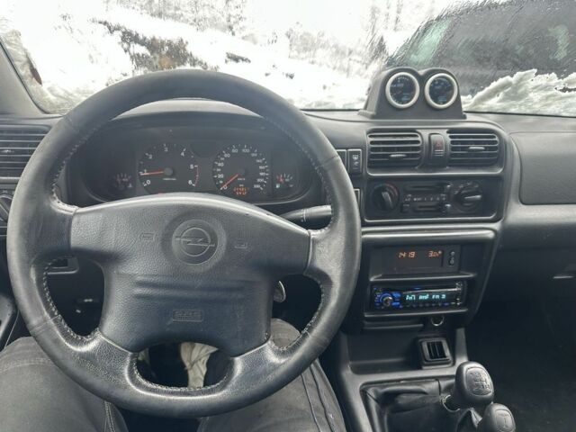 Черный Опель Фронтера, объемом двигателя 2.2 л и пробегом 280 тыс. км за 2750 $, фото 5 на Automoto.ua