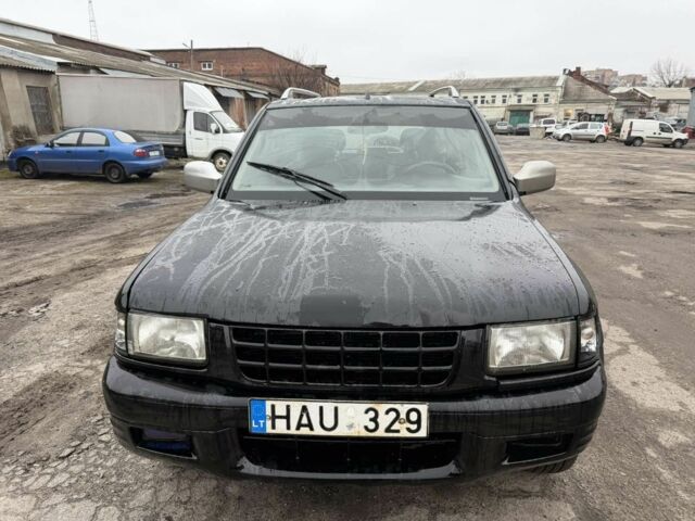 Черный Опель Фронтера, объемом двигателя 2.2 л и пробегом 276 тыс. км за 3500 $, фото 2 на Automoto.ua