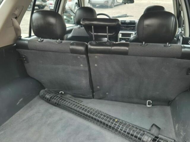 Черный Опель Фронтера, объемом двигателя 2.2 л и пробегом 260 тыс. км за 2400 $, фото 1 на Automoto.ua