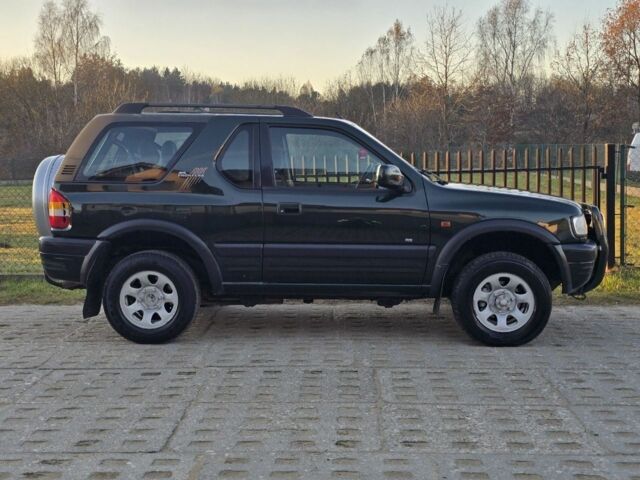 Чорний Опель Фронтера, об'ємом двигуна 2.2 л та пробігом 277 тис. км за 2000 $, фото 4 на Automoto.ua