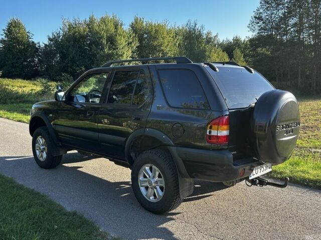 Черный Опель Фронтера, объемом двигателя 2.2 л и пробегом 278 тыс. км за 2200 $, фото 2 на Automoto.ua