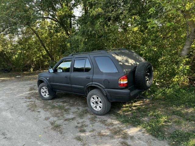 Черный Опель Фронтера, объемом двигателя 2.2 л и пробегом 300 тыс. км за 3717 $, фото 2 на Automoto.ua