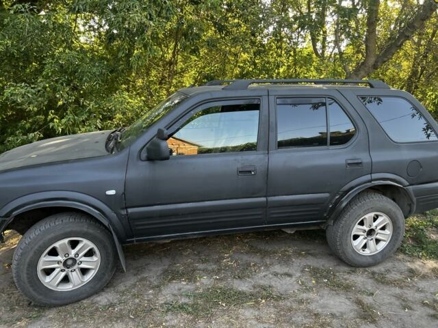 Черный Опель Фронтера, объемом двигателя 2.2 л и пробегом 300 тыс. км за 3717 $, фото 1 на Automoto.ua