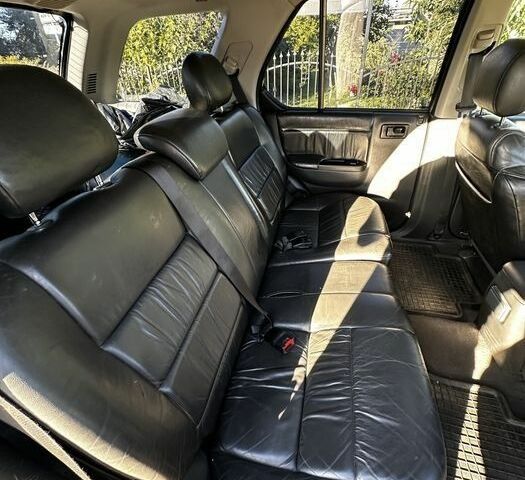 Черный Опель Фронтера, объемом двигателя 2.2 л и пробегом 278 тыс. км за 2200 $, фото 3 на Automoto.ua