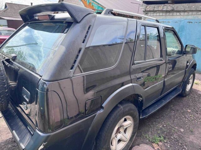 Черный Опель Фронтера, объемом двигателя 2.4 л и пробегом 2 тыс. км за 3000 $, фото 9 на Automoto.ua