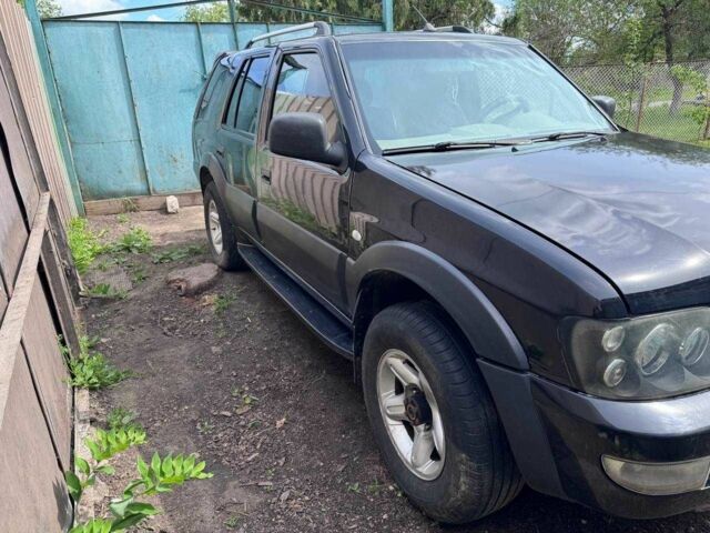 Черный Опель Фронтера, объемом двигателя 2.4 л и пробегом 2 тыс. км за 3000 $, фото 1 на Automoto.ua