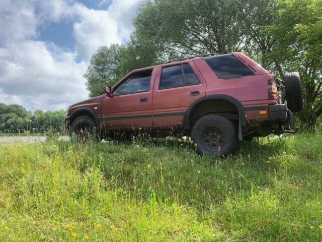 Красный Опель Фронтера, объемом двигателя 2.3 л и пробегом 290 тыс. км за 2500 $, фото 1 на Automoto.ua