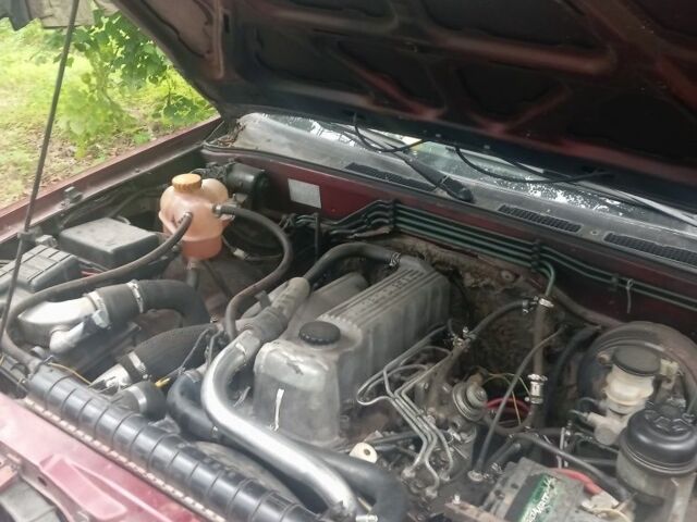 Красный Опель Фронтера, объемом двигателя 0 л и пробегом 336 тыс. км за 1785 $, фото 4 на Automoto.ua