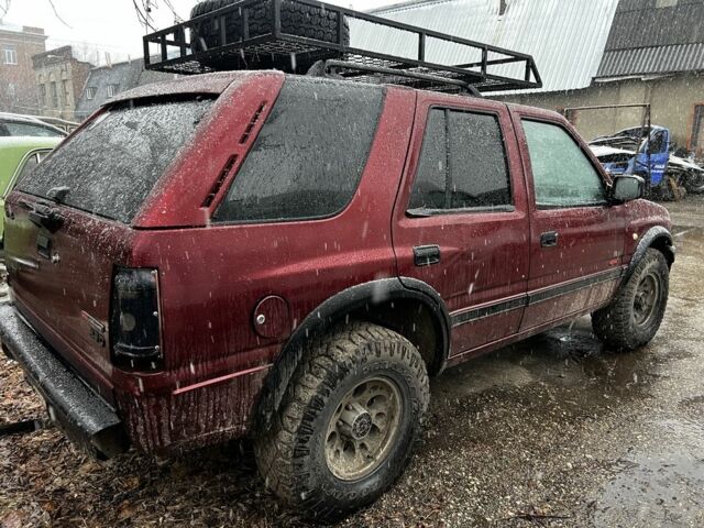 Красный Опель Фронтера, объемом двигателя 2.3 л и пробегом 285 тыс. км за 1150 $, фото 4 на Automoto.ua