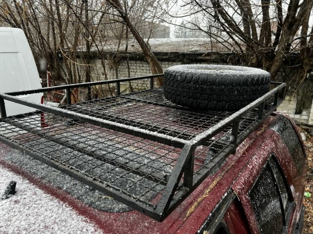 Красный Опель Фронтера, объемом двигателя 2.3 л и пробегом 285 тыс. км за 1150 $, фото 7 на Automoto.ua