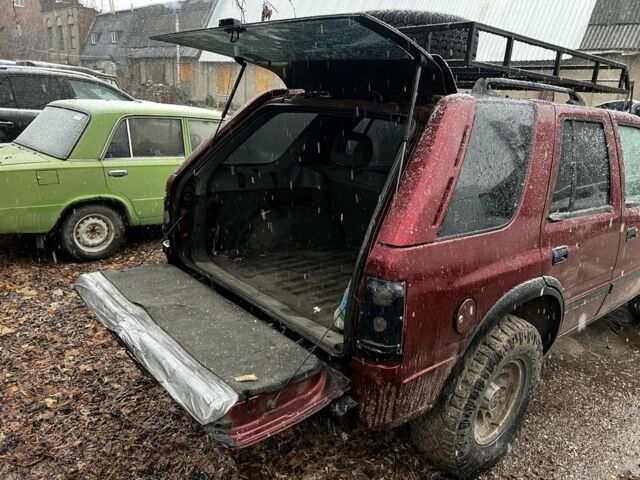 Красный Опель Фронтера, объемом двигателя 2.3 л и пробегом 285 тыс. км за 1150 $, фото 2 на Automoto.ua