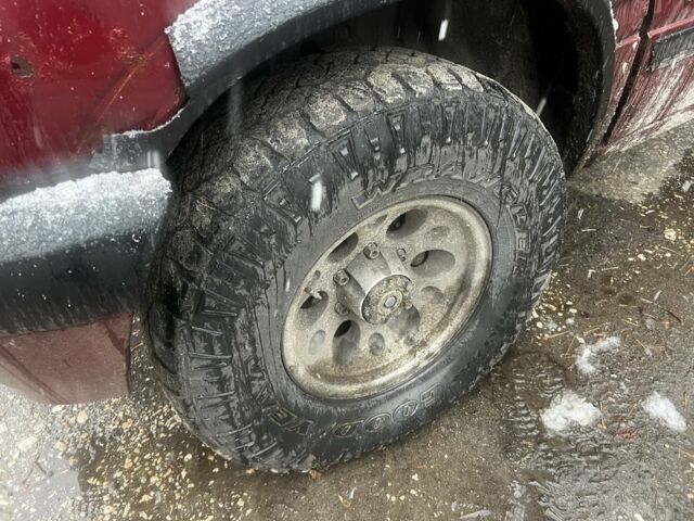 Красный Опель Фронтера, объемом двигателя 2.3 л и пробегом 285 тыс. км за 1150 $, фото 8 на Automoto.ua