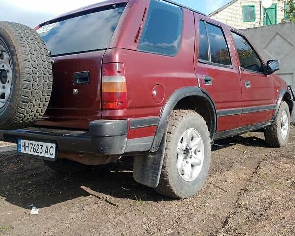 Красный Опель Фронтера, объемом двигателя 2.2 л и пробегом 280 тыс. км за 3370 $, фото 2 на Automoto.ua