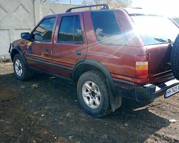 Красный Опель Фронтера, объемом двигателя 2.2 л и пробегом 280 тыс. км за 3370 $, фото 3 на Automoto.ua