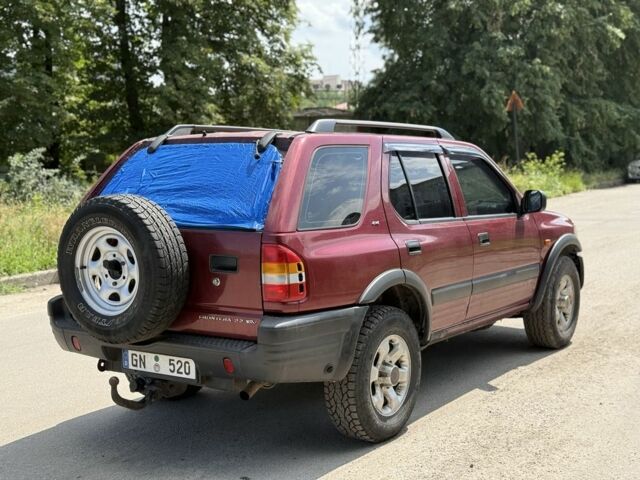 Красный Опель Фронтера, объемом двигателя 0 л и пробегом 200 тыс. км за 2100 $, фото 2 на Automoto.ua