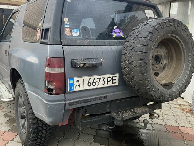 Сірий Опель Фронтера, об'ємом двигуна 2 л та пробігом 200 тис. км за 3931 $, фото 1 на Automoto.ua