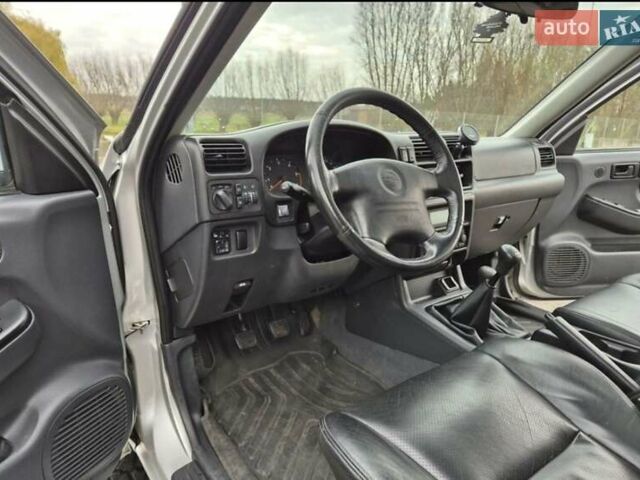 Серый Опель Фронтера, объемом двигателя 2.2 л и пробегом 220 тыс. км за 1900 $, фото 5 на Automoto.ua