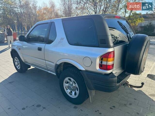 Сірий Опель Фронтера, об'ємом двигуна 2.2 л та пробігом 242 тис. км за 5200 $, фото 2 на Automoto.ua