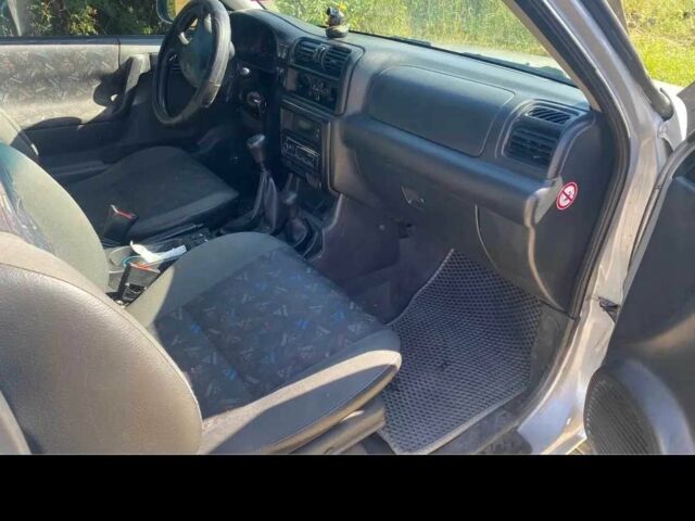 Сірий Опель Фронтера, об'ємом двигуна 2.2 л та пробігом 250 тис. км за 6000 $, фото 7 на Automoto.ua